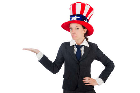 Young woman with american symbols on whiteの写真素材