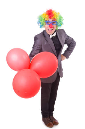 Businessman with crown isolated on whiteの写真素材