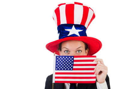 Young woman with american symbols on white
