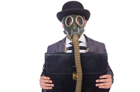 Businessman wearing gas mask isolated on whiteの写真素材