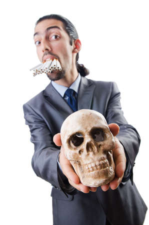 Antismoking concept with man and skullの写真素材