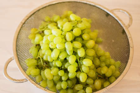 Green grapes in healthy eating concept