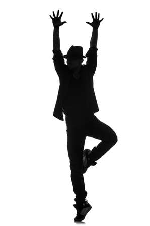 silhouette of male dancer isolated on whiteの写真素材