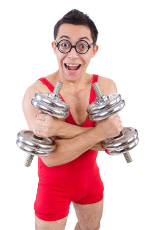 Funny guy exercising with dumbbells on whiteの写真素材