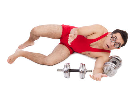 Funny guy exercising with dumbbells on whiteの写真素材