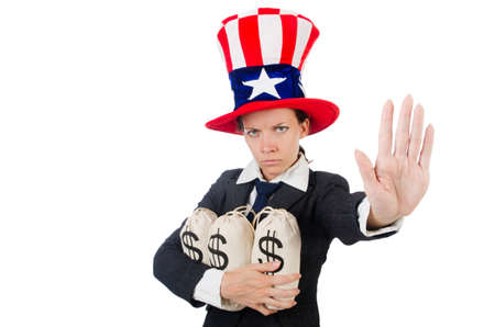 Businesswoman with sacks of money on whiteの写真素材