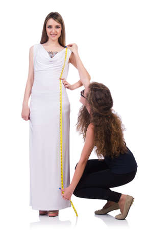 Tailor and client isolated on the white backgroundの写真素材