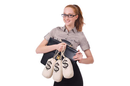 Young businesswoman with money sacks on whiteの写真素材