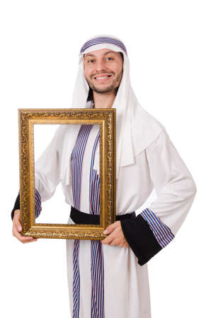 Young arab with picture frame on whiteの写真素材