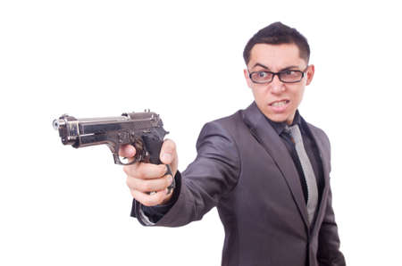 Funny businessman with gun on whiteの写真素材