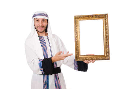 Young arab with picture frame on whiteの写真素材