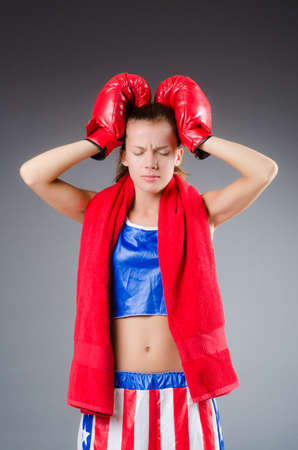 Woman boxer in uniform with US symbols