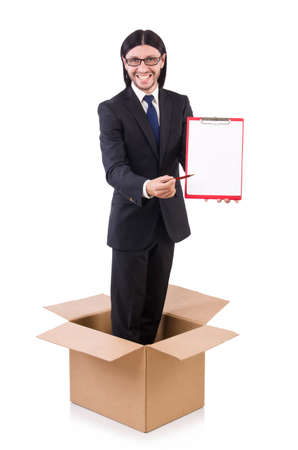 Young businessman in thinking out of box conceptの写真素材