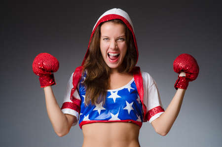 Woman boxer in uniform with US symbolsの写真素材