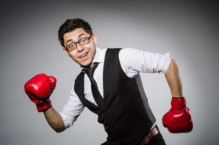 Funny boxer businessman in sport concept