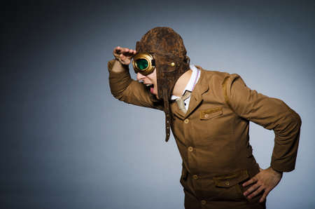 Funny pilot with goggles and helmetの写真素材