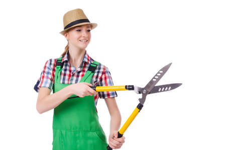 Young woman with shears on whiteの写真素材