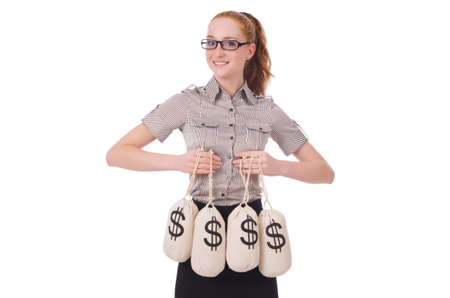 Young businesswoman with money sacks on whiteの写真素材