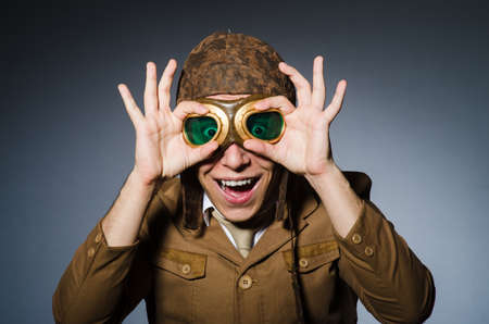 Funny pilot with goggles and helmetの写真素材