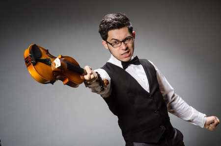 Funny violin player with fiddleの写真素材