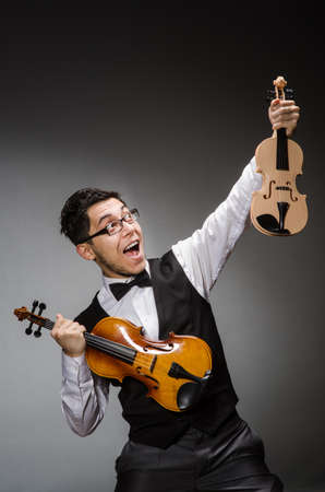 Funny violin player with fiddleの写真素材