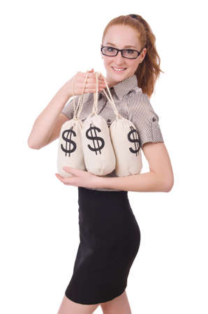 Young businesswoman with money sacks on whiteの写真素材