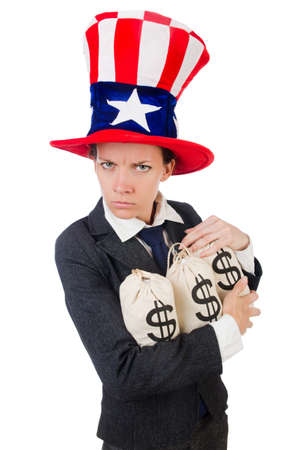 Businesswoman with sacks of money on whiteの写真素材