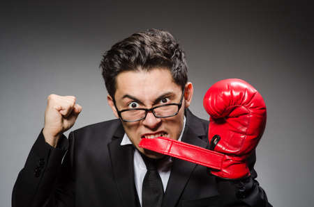 Funny boxer businessman in sport conceptの写真素材
