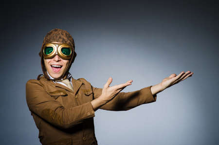 Funny pilot with goggles and helmetの写真素材