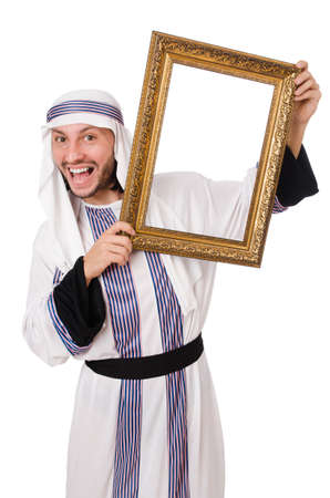 Young arab with picture frame on whiteの写真素材