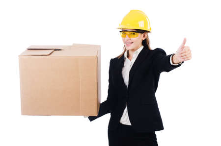 Young businesswoman with box isolated on whiteの写真素材