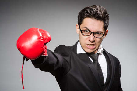 Funny boxer businessman in sport conceptの写真素材