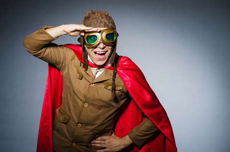 Funny pilot with goggles and helmetの写真素材