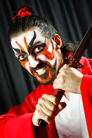 Man with sword and face maskの写真素材