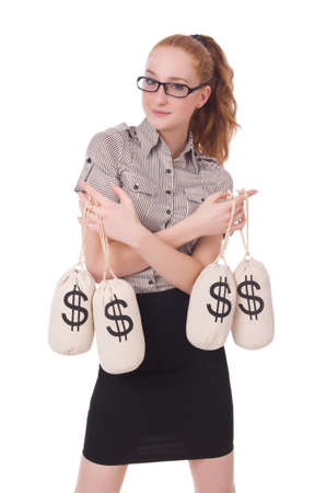 Young businesswoman with money sacks on whiteの写真素材