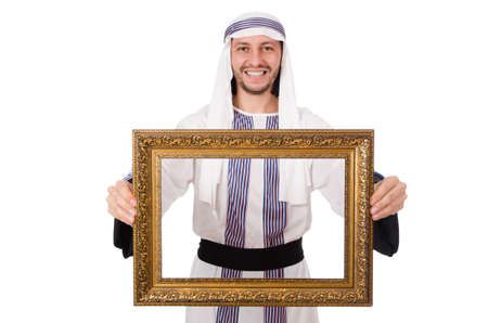 Young arab with picture frame on whiteの写真素材