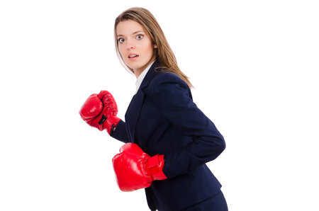 Woman businesswoman with boxing gloves on white