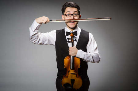 Funny violin player with fiddleの写真素材