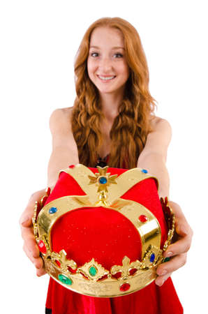Redhead pretty girl in queen concept isolated on whiteの写真素材