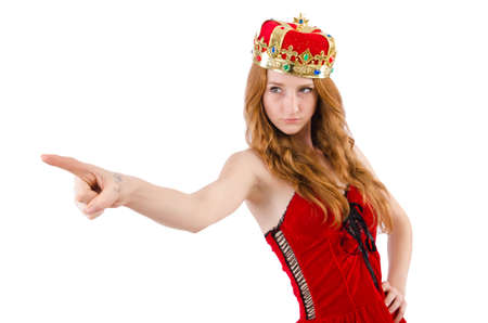 Redhead pretty  girl with crown pressing virtual buttons  isolated on whiteの写真素材