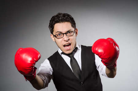 Funny boxer businessman in sport conceptの写真素材