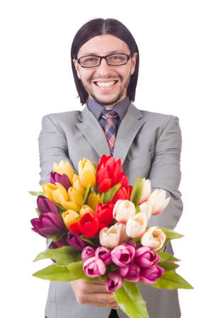 Man with flowers isolated on the whiteの写真素材