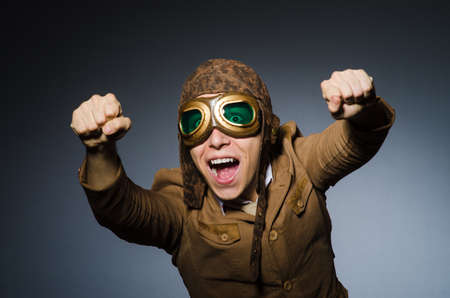 Funny pilot with goggles and helmetの写真素材