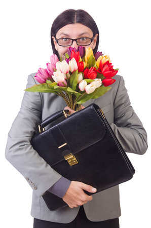 Man with flowers isolated on the whiteの写真素材