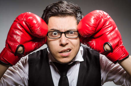 Funny boxer businessman in sport concept