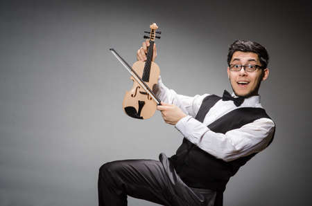 Funny violin player with fiddleの写真素材