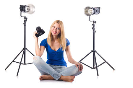 Woman with camera isolated on the white