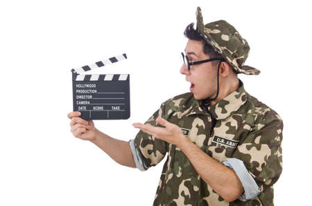 Funny soldier with movie board isolated on the whiteの写真素材