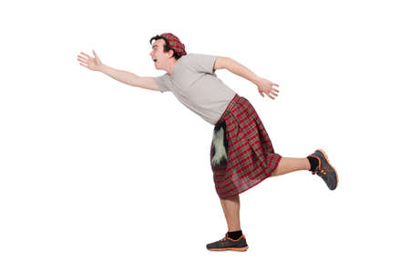 Funny scotsman isolated on whiteの写真素材