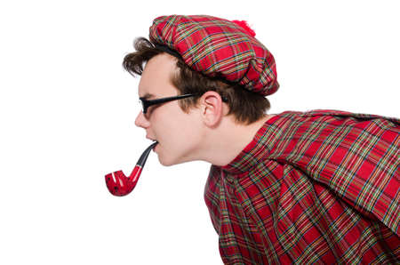 Scotsman with smoking pipe isolated on whiteの写真素材